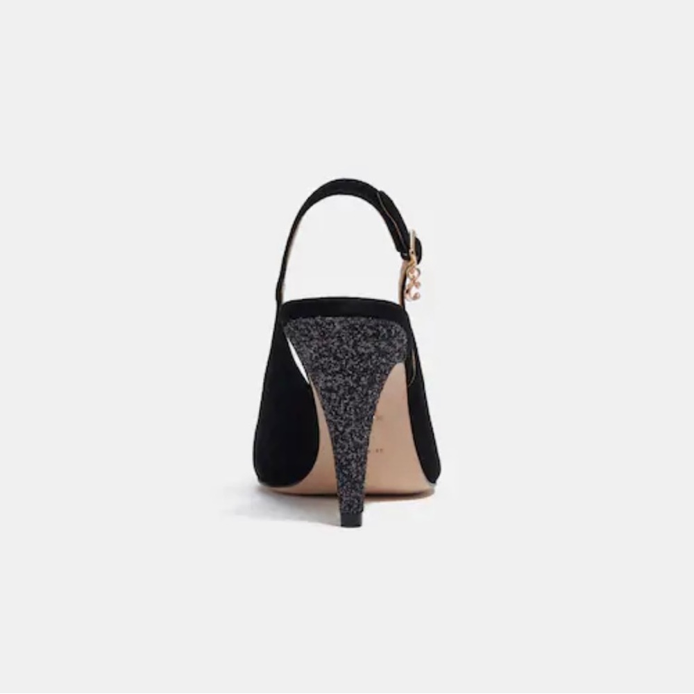 Coach women’s mid heel pumps